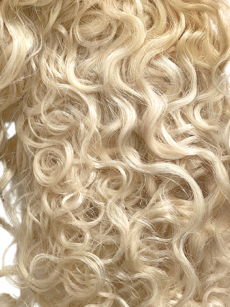 Deep Curly Tape-In Hair Extensions (Light Colours)