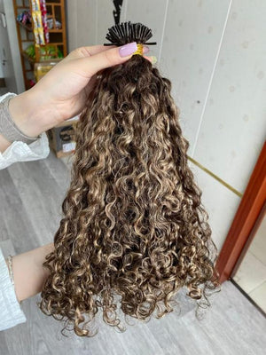 Deep curly micro ring hair balayage